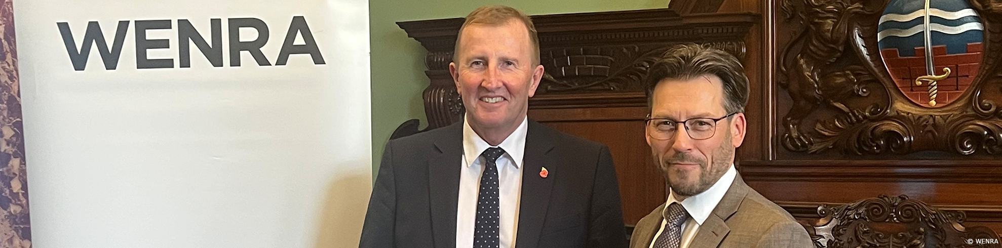 Mark Foy and Petteri Tiippana next to WENRA roll-up